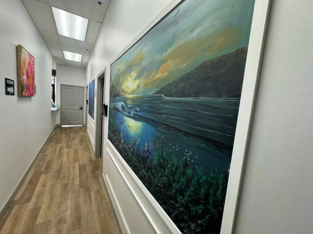 Art-decorated hallway at Palm Urgent Care San Ysidro clinic